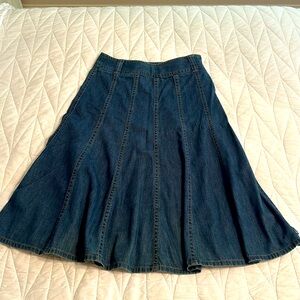 Long denim paneled skirt.